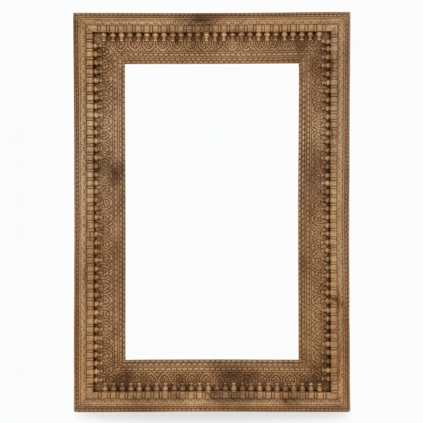 Handcrafted wooden photo frame with intricate tribal carving and natural finish
