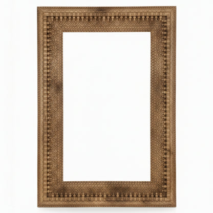 Handcrafted wooden photo frame with intricate tribal carving and natural finish