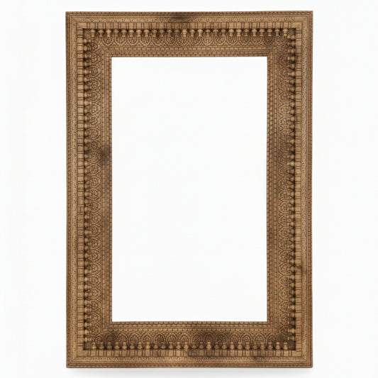 Handcrafted wooden photo frame with intricate tribal carving and natural finish