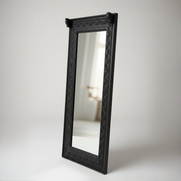 Ashva Wooden Mirror Frame in black with intricately carved wooden border, showcasing a traditional tribal handicraft design perfect for elegant home decor.