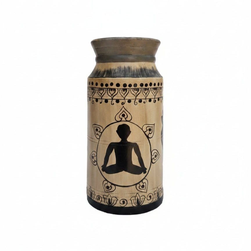 Handcrafted wooden pot featuring a hand-painted black silhouette of a meditating figure with traditional tribal decorative patterns, perfect for unique home decor.