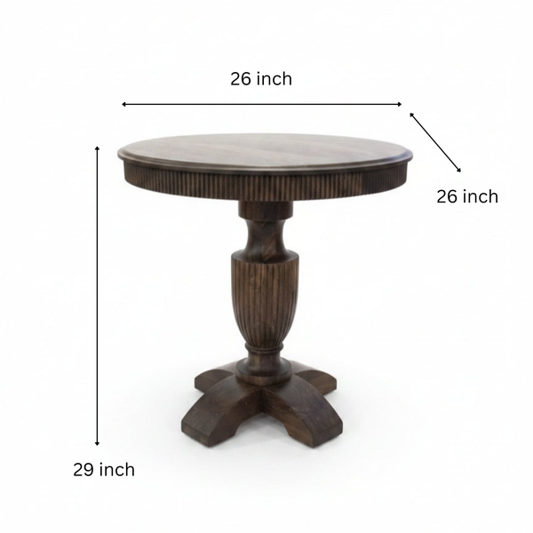 Round wooden pedestal table with handcrafted tribal-inspired details, featuring a sturdy central column and four curved legs, perfect for unique home decor.