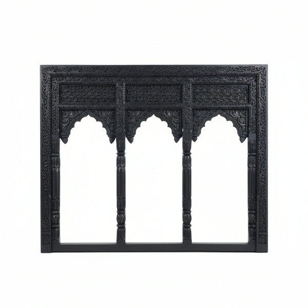 Jharokha Wall Hanging – a stunning handicraft decor piece featuring an ornate black carved wooden frame with three arched openings, detailed floral and geometric patterns, and decorative columns, set against a plain white background.