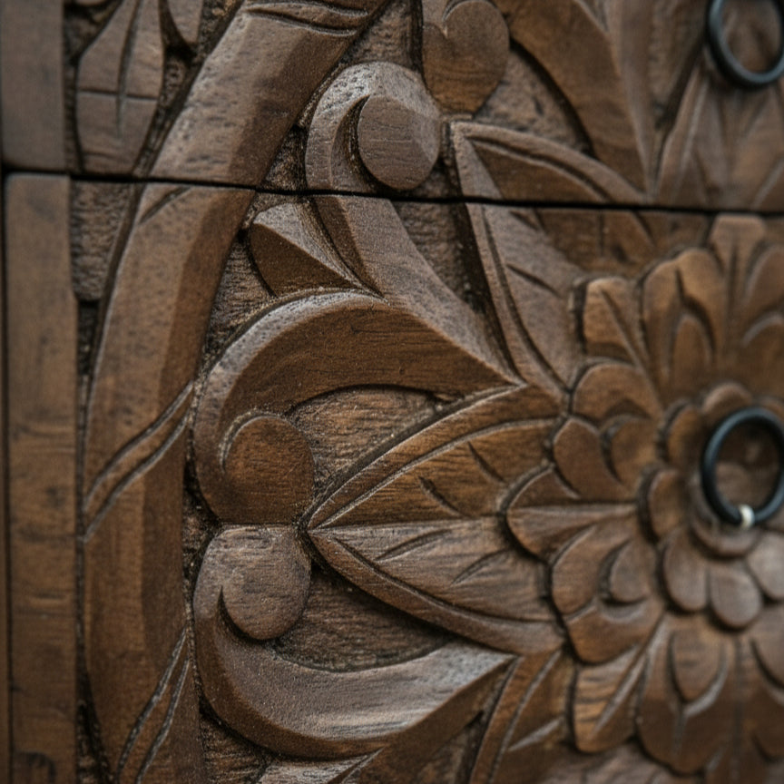 Hand-carved wooden drawer with floral tribal pattern and metal ring pulls
