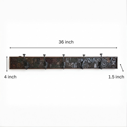 Karigar Block Coat Rack featuring a long wooden panel with intricate tribal handicraft patterns and six metal hooks, perfect for stylish decor and functional use.