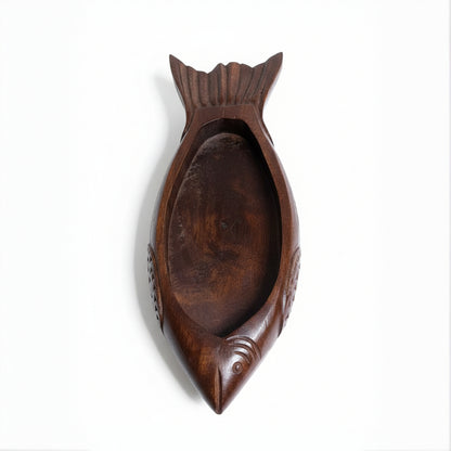 Handcrafted wooden organizer tray in a fish shape with smooth finish and tribal-inspired detailing, ideal for unique decor and functional storage.