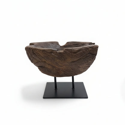 Prakriti Root Bowl Decor is a wooden handcrafted decorative bowl with natural textures and an organic form, mounted on a minimalist black metal stand.