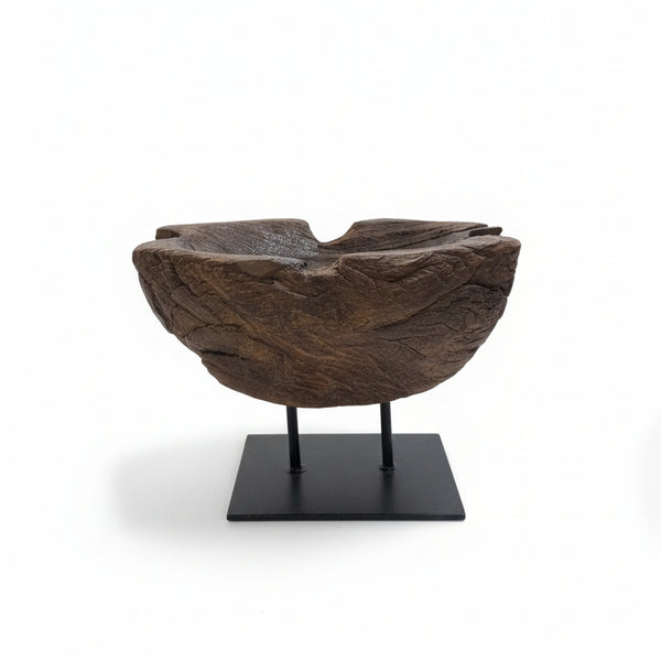 Prakriti Root Bowl Decor is a wooden handcrafted decorative bowl with natural textures and an organic form, mounted on a minimalist black metal stand.