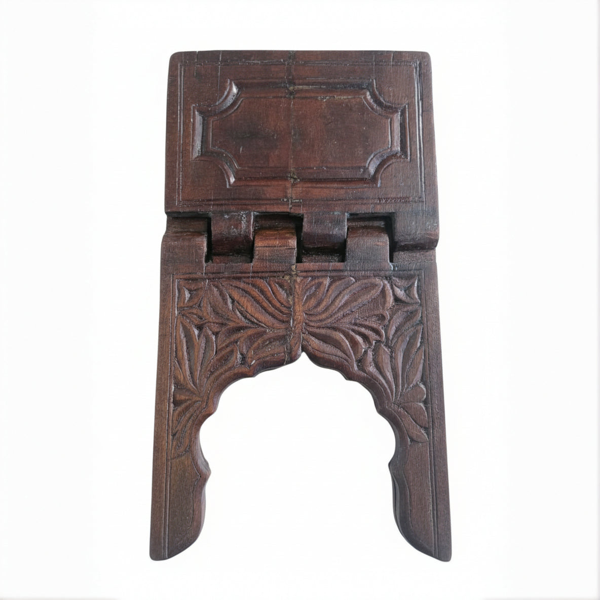 Rehal Wooden Carved Bookstand made of dark wood featuring intricate floral and geometric carving, designed for holding books or holy scriptures as a decorative handicraft piece.