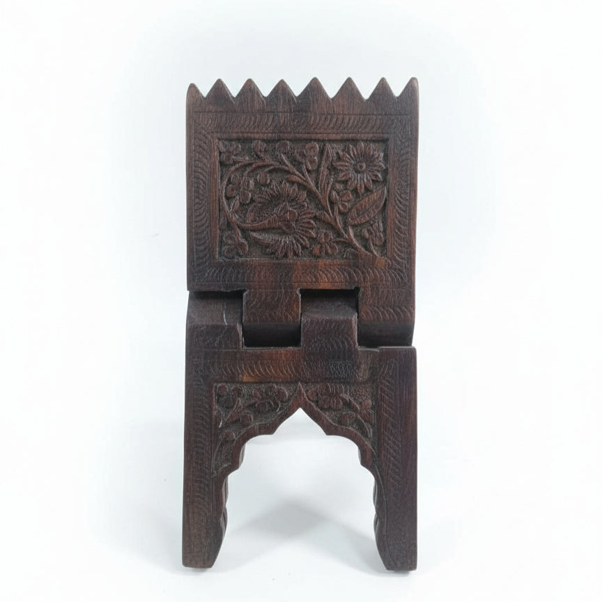 Rehal Wooden Carved Bookstand made of dark wood featuring intricate floral hand-carved designs, showcasing traditional handicraft decor for holding books elegantly.