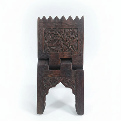 Rehal Wooden Carved Bookstand made of dark wood featuring intricate floral hand-carved designs, showcasing traditional handicraft decor for holding books elegantly.