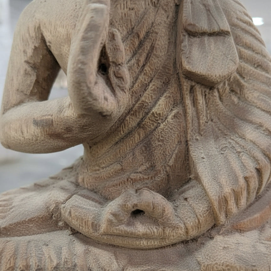 Hand-carved wooden elephant statue close-up, tribal handicraft detail