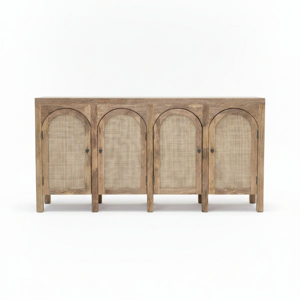 Wooden sideboard with four doors featuring woven rattan cane panels and a natural finish, showcasing authentic tribal handicraft decor elements.