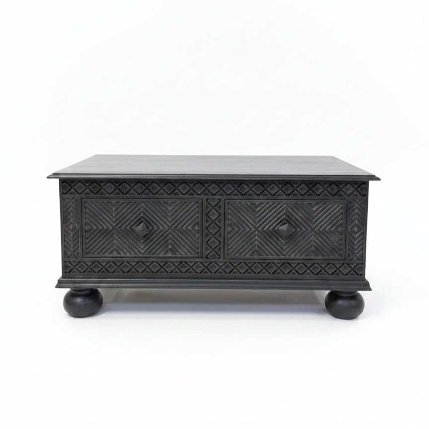 Yantra Storage Coffee Unit in dark wood with intricate tribal handicraft patterns, featuring two front drawers and rounded legs, perfect for stylish decor and storage.