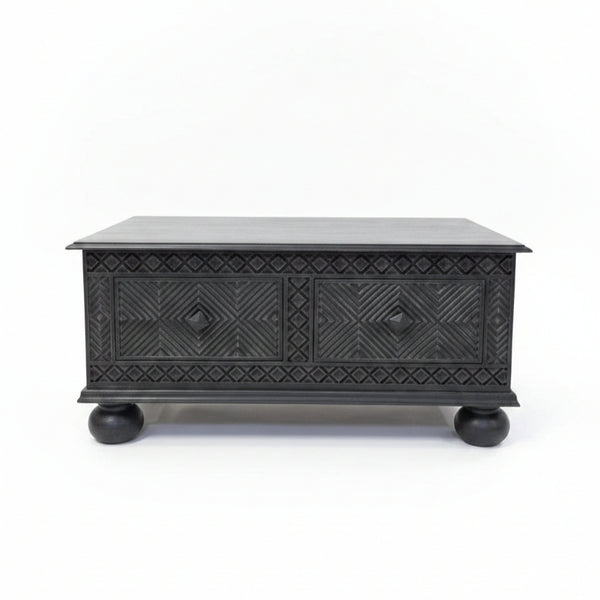 Yantra Storage Coffee Unit in dark wood with intricate tribal handicraft patterns, featuring two front drawers and rounded legs, perfect for stylish decor and storage.