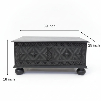 Yantra Storage Coffee Unit in dark wood with intricate tribal handicraft patterns, featuring two front drawers and rounded legs, perfect for stylish decor and storage.